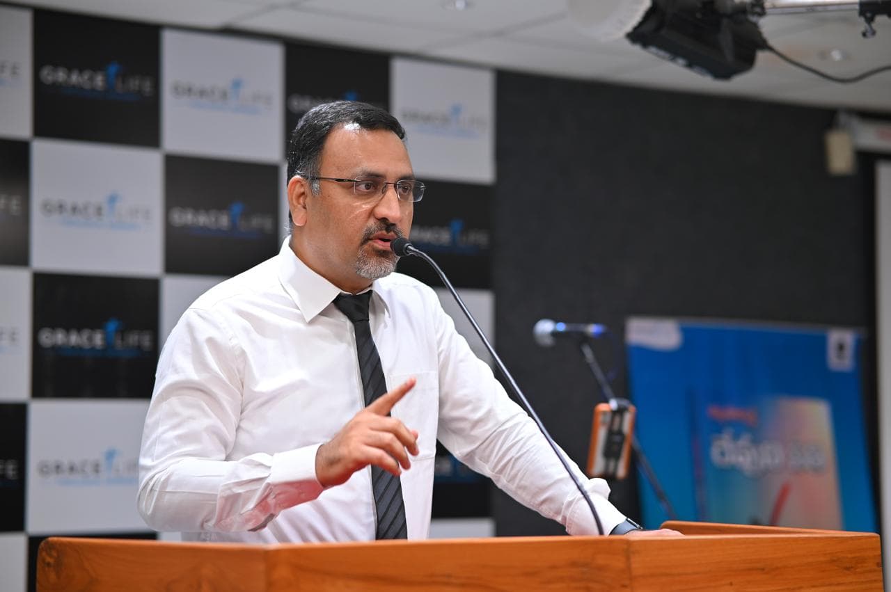 Pastor preaching at the pulpit of Grace Life Church